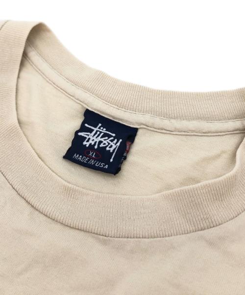 stussy（ステューシー）stussy (ステューシー) プリントTシャツ ベージュ サイズ:XLの古着・服飾アイテム