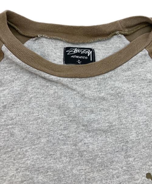 stussy（ステューシー）stussy (ステューシー) ラグランTシャツ グレー サイズ:Lの古着・服飾アイテム