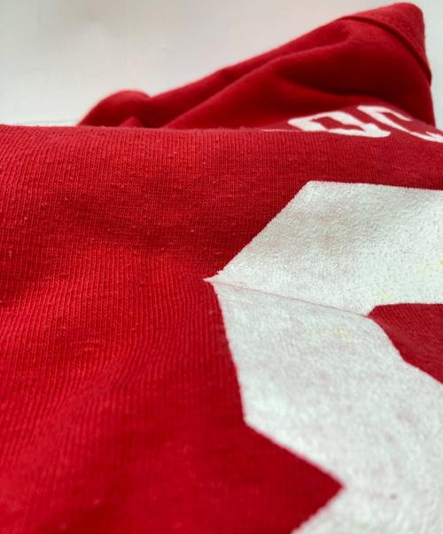 Champion（チャンピオン）Champion (チャンピオン) ヴィンテージフットボールTシャツ レッド サイズ:Lの古着・服飾アイテム