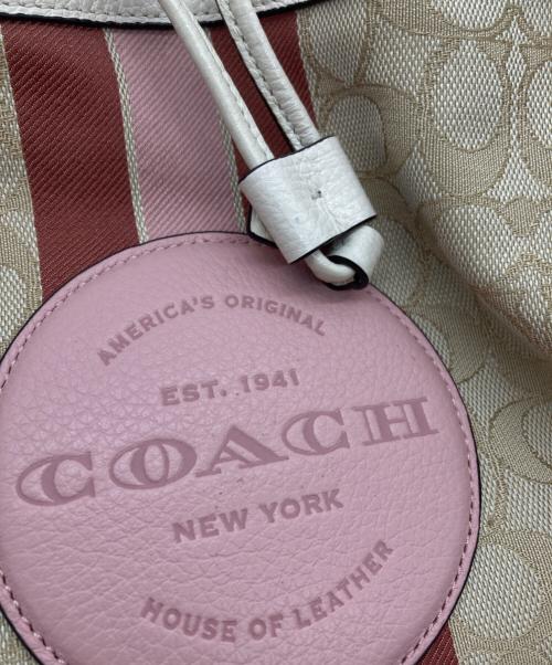 COACH（コーチ）COACH (コーチ) デンプシー ドローストリング バケット バッグ アイボリーの古着・服飾アイテム