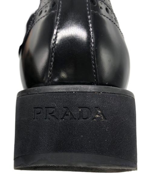 PRADA（プラダ）PRADA (プラダ) メダリオン ウィングチップ レザー ダービーシューズ ブラック サイズ:6 1/2の古着・服飾アイテム