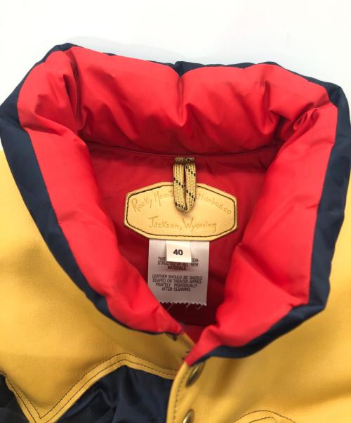 RockyMountainFeatherBed（ロッキーマウンテンフェザーベッド）RockyMountainFeatherBed (ロッキーマウンテンフェザーベッド) BAPE BY A BATHING APE (ベイプバイアベイシングエイプ) ダウンベスト ネイビー×ベージュ サイズ:SIZE 40の古着・服飾アイテム