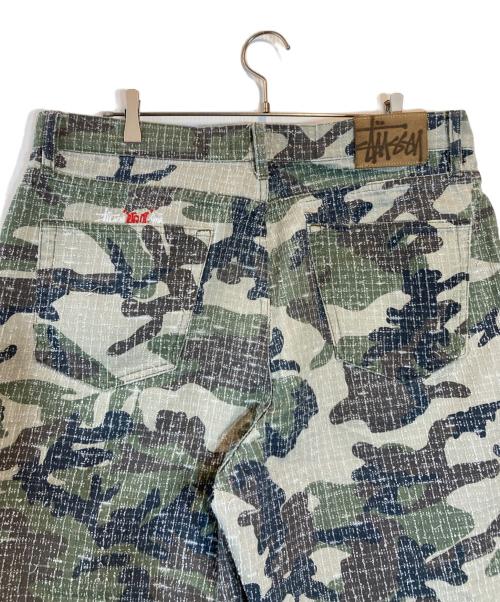 stussy（ステューシー）stussy (ステューシー) BIG OL' JEAN CAMO CANVAS NEEDLE PUNCH グリーン サイズ:SIZE 34の古着・服飾アイテム