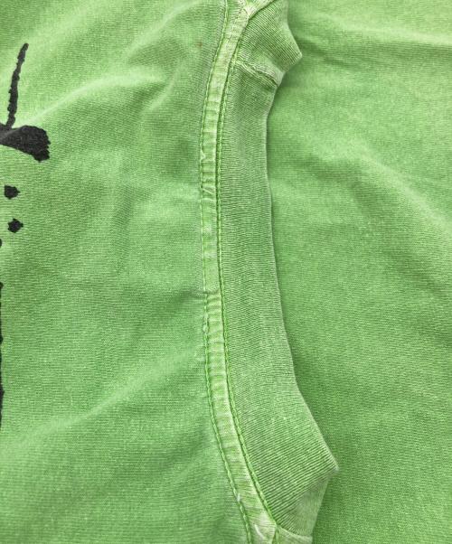 stussy（ステューシー）stussy (ステューシー) サーフマン半袖Tシャツ グリーン サイズ:Lの古着・服飾アイテム