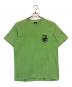 stussy（ステューシー）の古着「サーフマン半袖Tシャツ」｜グリーン
