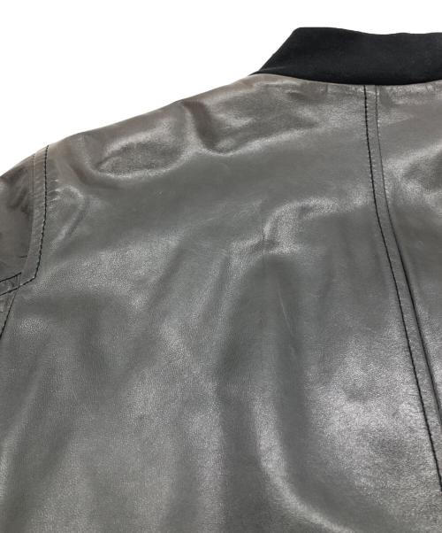 Yves Saint Laurent（イヴサンローラン）Yves Saint Laurent (イヴサンローラン) ラムレザー アシンメトリージャケット ブラック×グレー サイズ:44の古着・服飾アイテム