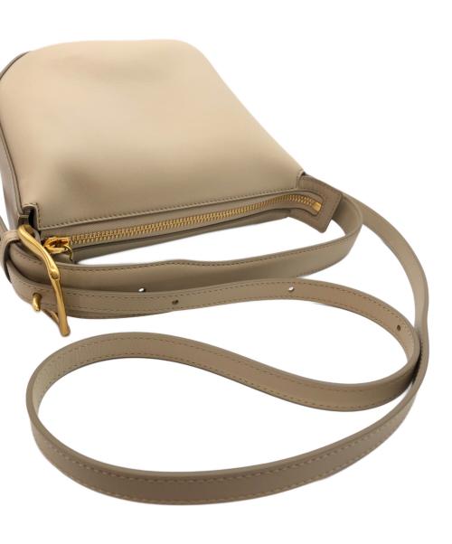 J&M DAVIDSON（ジェイ＆エム デヴィッドソン）J&M DAVIDSON (ジェイ＆エム デヴィッドソン) QUIVER ZIP ベージュの古着・服飾アイテム