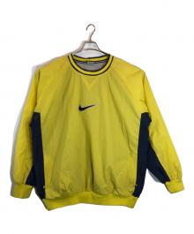 NIKE（ナイキ）の古着「ナイロンプルオーバー」｜イエロー