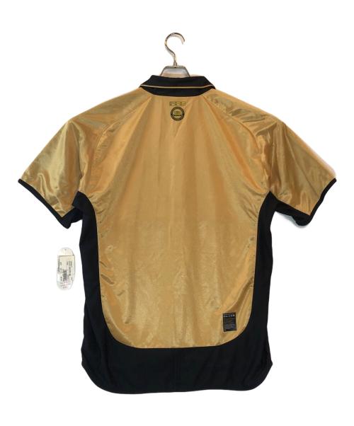 UMBRO（アンブロ）UMBRO (アンブロ) ゲームシャツ ゴールド サイズ:L 未使用品の古着・服飾アイテム
