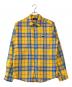 WE11DONE（ウェルダン）の古着「CHECKED LOGO PRINT SHIRT」｜オレンジ