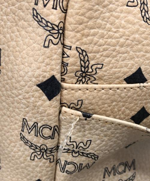 MCM（エムシーエム）MCM (エムシーエム) スタッズリュック アイボリーの古着・服飾アイテム
