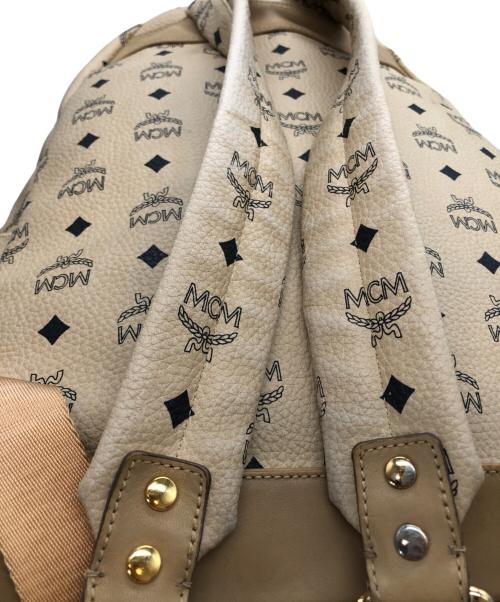 MCM（エムシーエム）MCM (エムシーエム) スタッズリュック アイボリーの古着・服飾アイテム