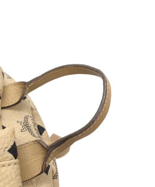 MCM（エムシーエム）MCM (エムシーエム) スタッズリュック アイボリーの古着・服飾アイテム