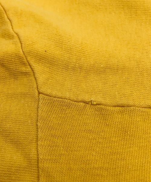 Champion（チャンピオン）Champion (チャンピオン) 両面プリントフットボールTシャツ イエロー サイズ:LARGEの古着・服飾アイテム