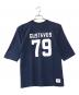 Champion（チャンピオン）の古着「両面プリントフットボールTシャツ」｜ネイビー