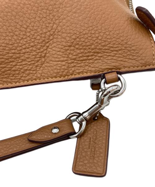 COACH（コーチ）COACH (コーチ) キャリーオール ポーチ ブラウンの古着・服飾アイテム