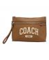 COACH（コーチ）の古着「キャリーオール ポーチ」｜ブラウン