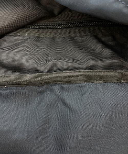 UNDERCOVER（アンダーカバー）UNDERCOVER (アンダーカバー) メタルプレートナイロンリュック ネイビーの古着・服飾アイテム