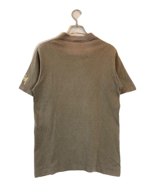 stussy（ステューシー）stussy (ステューシー) Mr.blob プリントTシャツ ブラウン サイズ:Sの古着・服飾アイテム