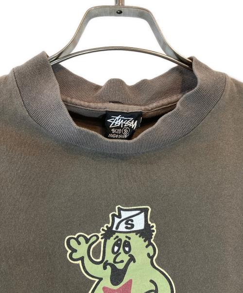 stussy（ステューシー）stussy (ステューシー) Mr.blob プリントTシャツ ブラウン サイズ:Sの古着・服飾アイテム