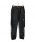 STONE ISLAND（ストーンアイランド）の古着「NYLON METAL RIPSTOP PANTS」｜ブラック