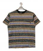 stussyステューシー）の古着「TOMTOM柄カットソー」｜ブラック×パープル×オレンジ