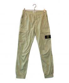 STONE ISLAND（ストーンアイランド）の古着「ストレッチ ガーメントダイ テーパードパンツ」｜イエロー