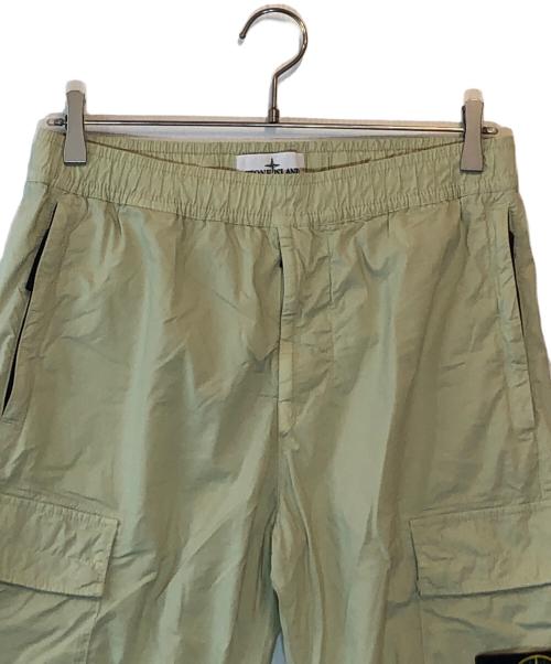 STONE ISLAND（ストーンアイランド）STONE ISLAND (ストーンアイランド) ストレッチ ガーメントダイ テーパードパンツ イエロー サイズ:30の古着・服飾アイテム