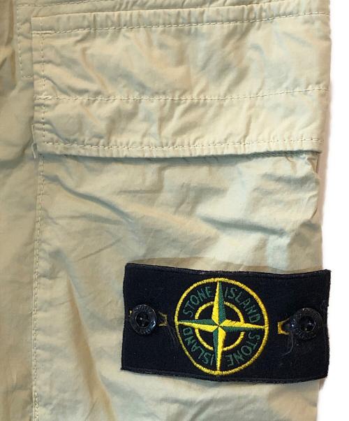 STONE ISLAND（ストーンアイランド）STONE ISLAND (ストーンアイランド) ストレッチ ガーメントダイ テーパードパンツ イエロー サイズ:30の古着・服飾アイテム