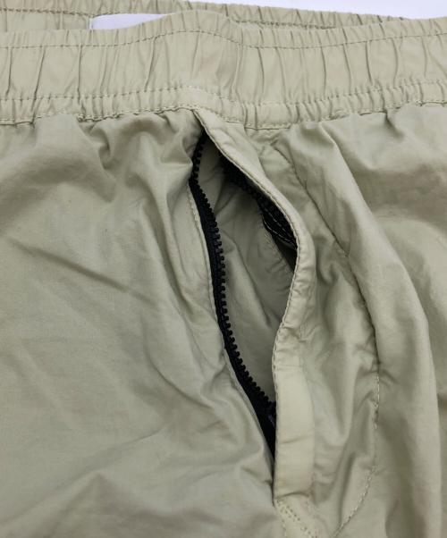 STONE ISLAND（ストーンアイランド）STONE ISLAND (ストーンアイランド) ストレッチ ガーメントダイ テーパードパンツ イエロー サイズ:30の古着・服飾アイテム