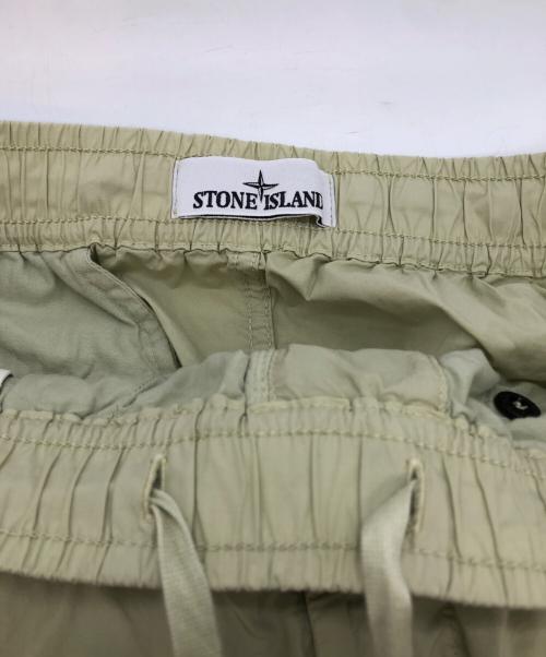 STONE ISLAND（ストーンアイランド）STONE ISLAND (ストーンアイランド) ストレッチ ガーメントダイ テーパードパンツ イエロー サイズ:30の古着・服飾アイテム