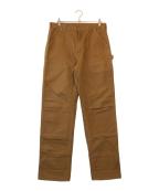 CarHarttカーハート）の古着「FIRM DUCK DOUBLE FRONT UTILITY WORK PANT」｜ブラウン
