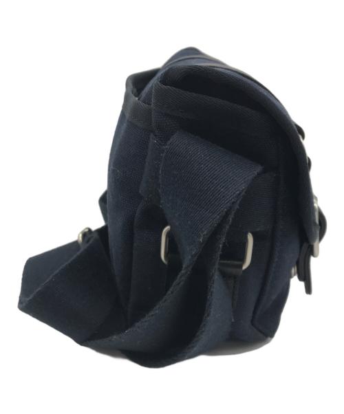 TOUT Y EST（トゥティエ）TOUT Y EST (トゥティエ) SAC BOUT MINI BAG(サック バウト ミニ バッグ) ネイビーの古着・服飾アイテム