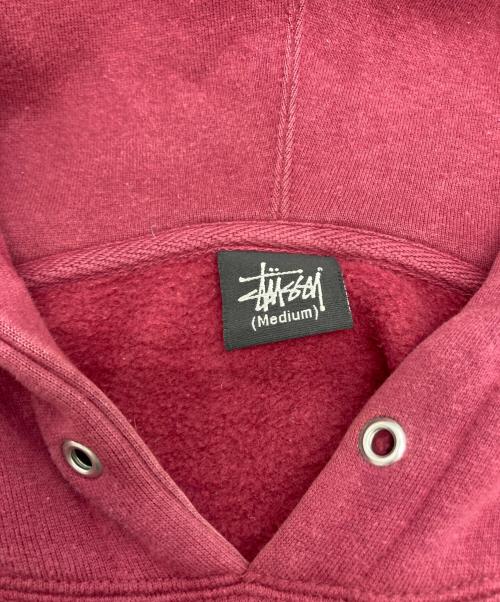 stussy（ステューシー）stussy (ステューシー) ［古着］スカル プルオーバーパーカー レッド サイズ:Mの古着・服飾アイテム