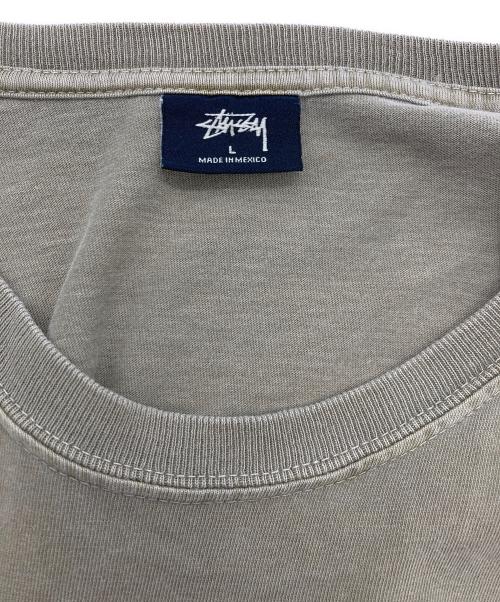 stussy（ステューシー）stussy (ステューシー) Rat Race Pigment Dyed Tee オリーブ サイズ:Lの古着・服飾アイテム