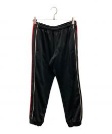 GUCCI（グッチ）の古着「Gucci Band Emblem Logo Embroidered Sideline Track Pants」｜ブラック