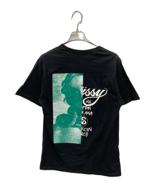 stussy（ステューシー）stussy (ステューシー) ワールドツアープリントTシャツ ブラック×パープル サイズ:Mの古着・服飾アイテム