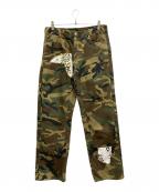 NOMARHYTHM TEXTILEノーマリズムテキスタイル）の古着「Sign Print Work Pants camo」｜グリーン