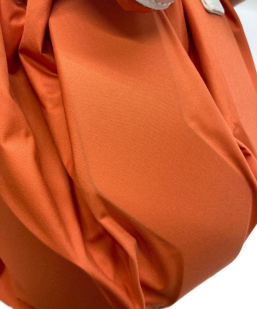 ISSEY MIYAKE（イッセイミヤケ）ISSEY MIYAKE (イッセイミヤケ) 2WAY巾着バッグ オレンジの古着・服飾アイテム