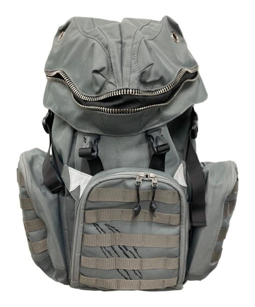 MORN CREATIONS（モーンクリエイションズ）MORN CREATIONS (モーンクリエイションズ) ティラノサウルスバックパック L グレーの古着・服飾アイテム