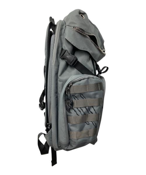 MORN CREATIONS（モーンクリエイションズ）MORN CREATIONS (モーンクリエイションズ) ティラノサウルスバックパック L グレーの古着・服飾アイテム