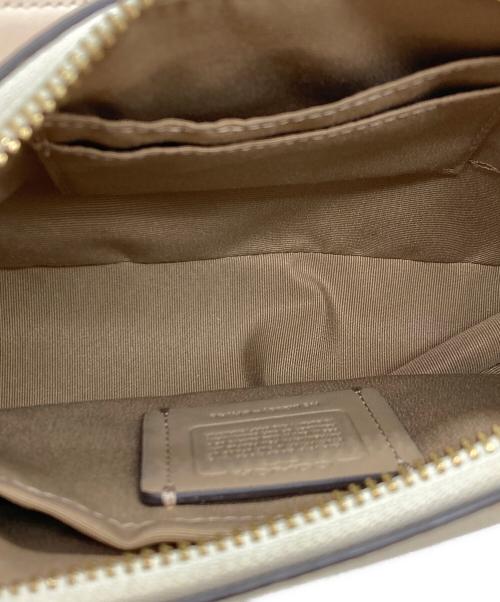 COACH（コーチ）COACH (コーチ) テリ ショルダー バッグ・フローラル プリント アイボリーの古着・服飾アイテム