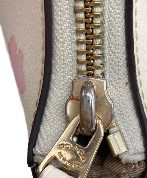 COACH（コーチ）COACH (コーチ) テリ ショルダー バッグ・フローラル プリント アイボリーの古着・服飾アイテム