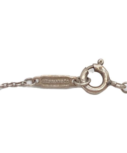 TIFFANY & Co.（ティファニー アンド コー）Tiffany & Co. (ティファニー) インターロッキングネックレス シルバーの古着・服飾アイテム