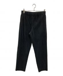 HOMME PLISSE ISSEY MIYAKE（オム プリッセ イッセイ ミヤケ）の古着「center pleat slacks」｜ブラック