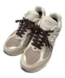 NEW BALANCE（ニューバランス）の古着「ローカットスニーカー」｜アイボリー×ブラウン