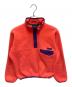 Patagonia（パタゴニア）の古着「サーモンピンク  ハーフスナップT」｜ピンク