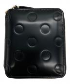 COMME des GARCONSコムデギャルソン）の古着「ドットエンボス2つ折り財布」｜ブラック
