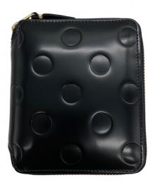 COMME des GARCONS（コムデギャルソン）の古着「ドットエンボス2つ折り財布」｜ブラック