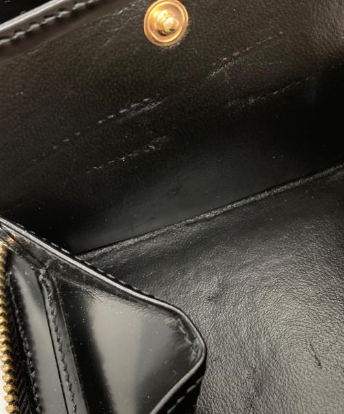 COMME des GARCONS（コムデギャルソン）COMME des GARCONS (コムデギャルソン) ドットエンボス2つ折り財布 ブラックの古着・服飾アイテム